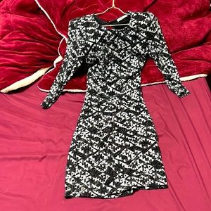 Tight fitting dress with open back